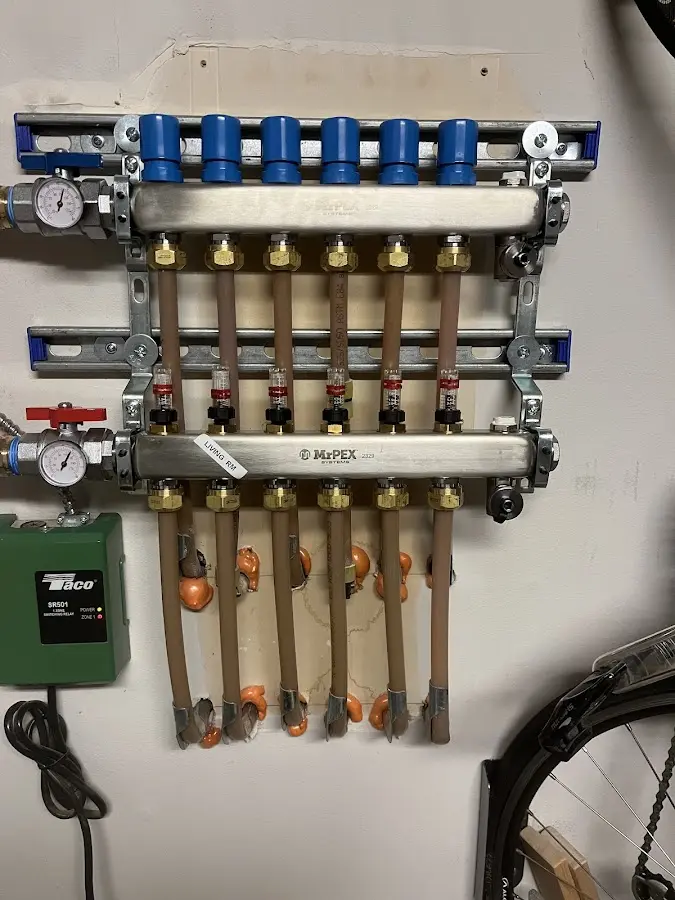 Plumber performing Water Heater Repair at a residential property in Columbus